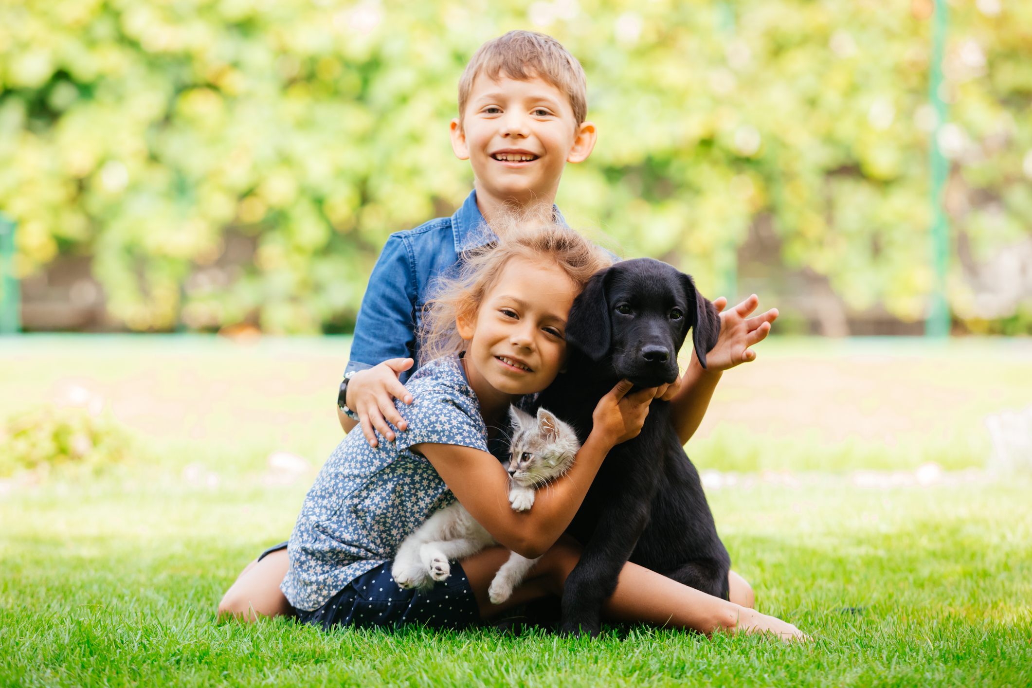 Portrait Of Kids With Dog